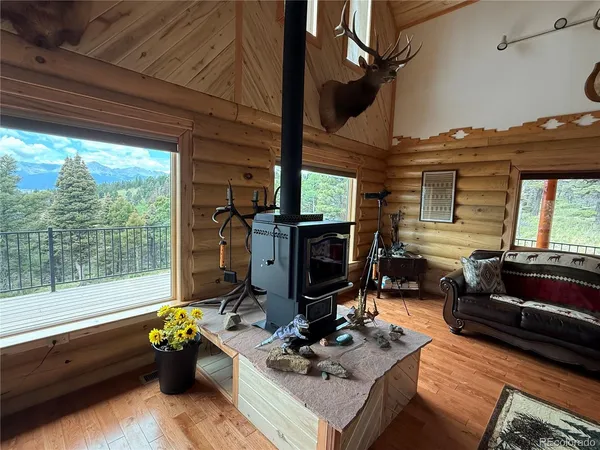 a view of balcony with wooden floor