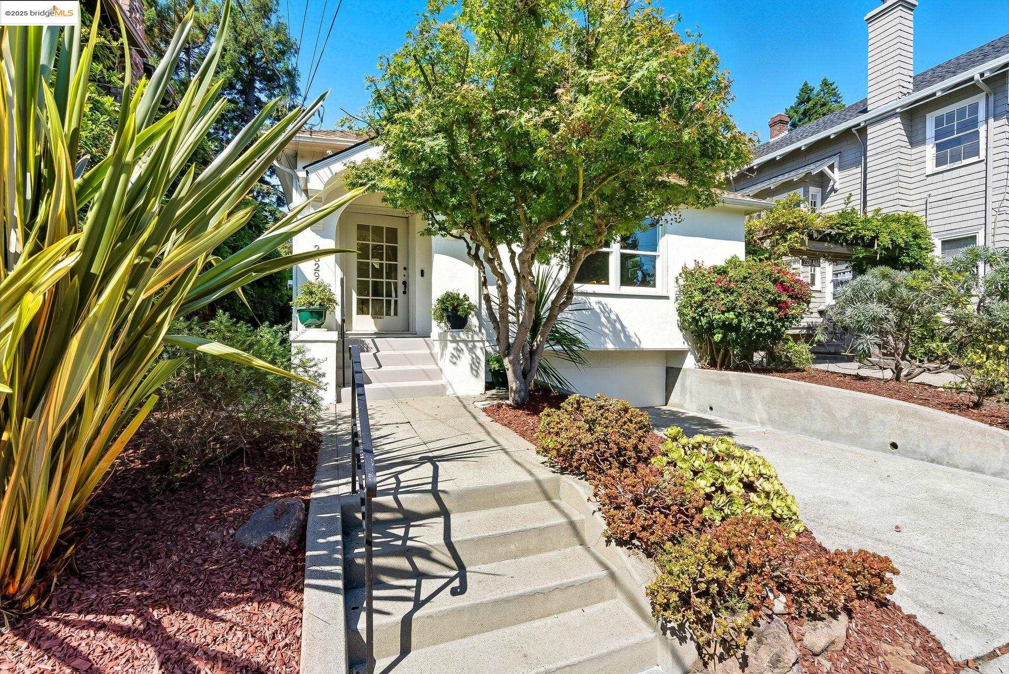 a view of yard with patio