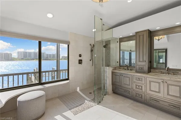 a view of a house with wooden fence