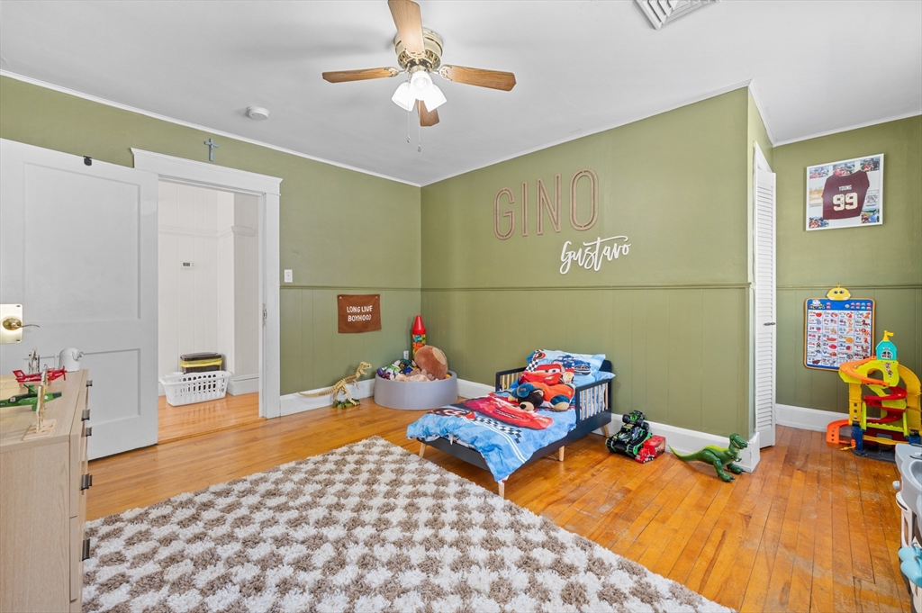 28 Barnard Road Worcester, MA 01605 - Photo 23 of 29 a bedroom with furniture and a chandelier fan