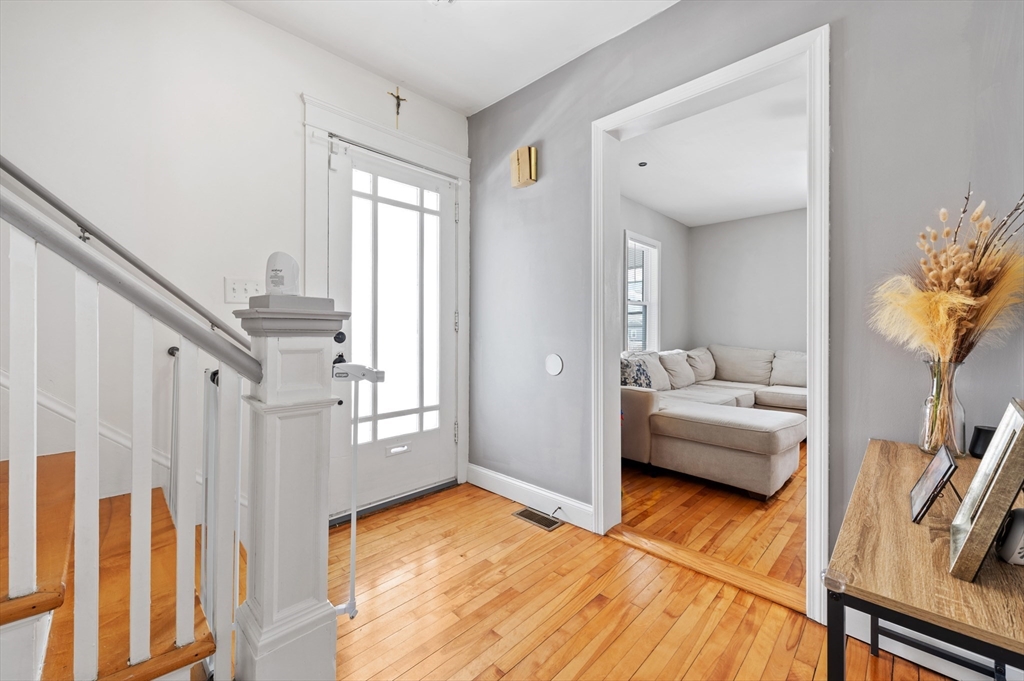 28 Barnard Road Worcester, MA 01605 - Photo 4 of 29 a view of a bedroom with furniture and staircase