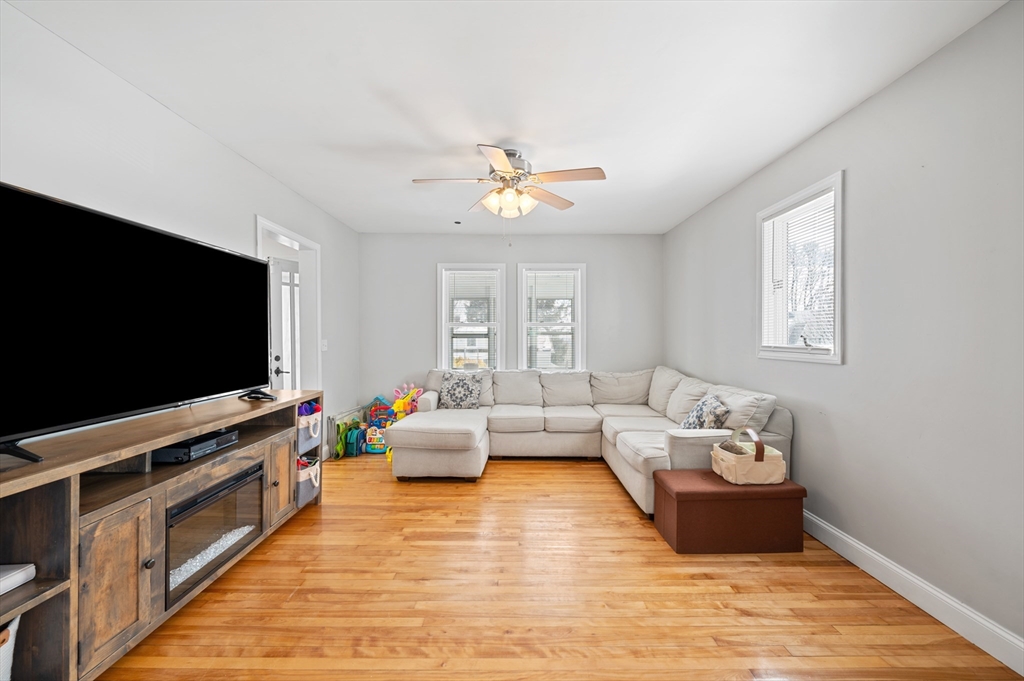 28 Barnard Road Worcester, MA 01605 - Photo 9 of 29 a living room with furniture and a flat screen tv