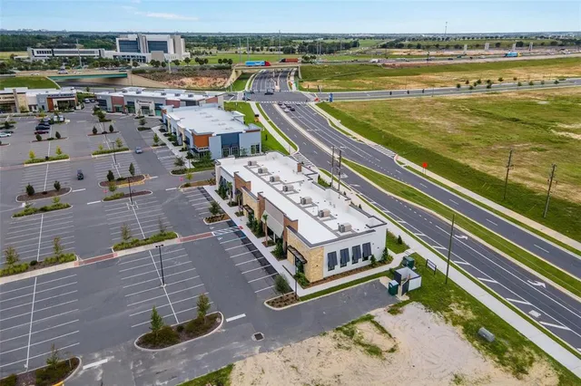 a view of a city with an ocean