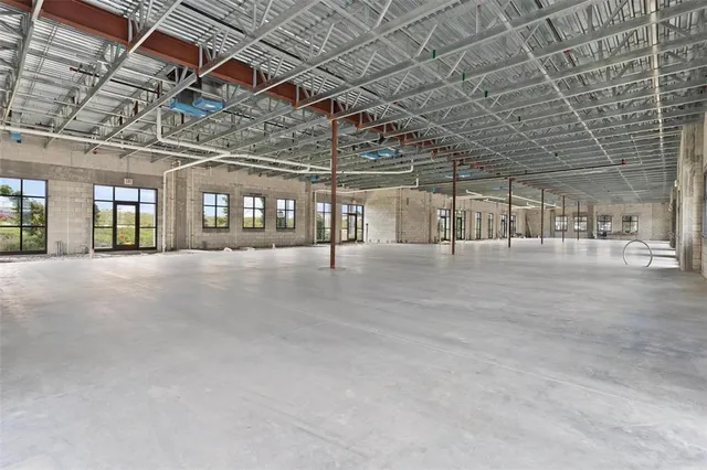 a view of a room with stainless steel appliances