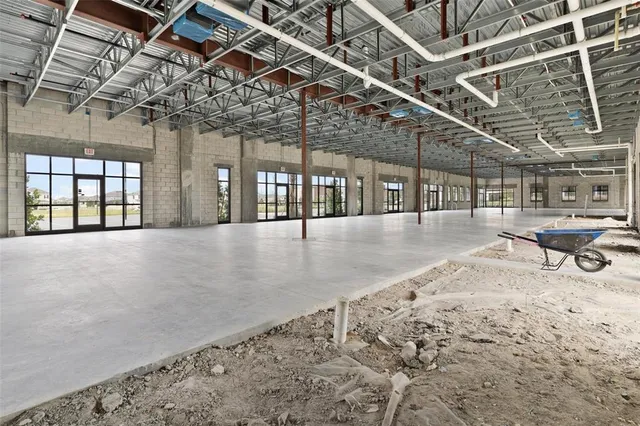 a view of a room with wooden roof