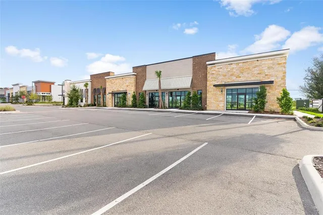 a view of a building with a street
