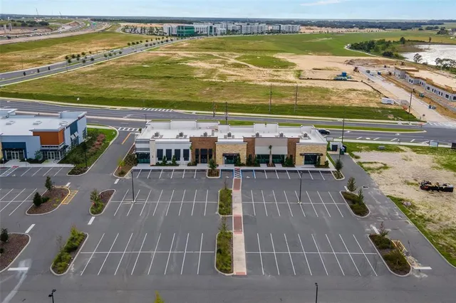 a view of an ocean with a swimming pool and seating space