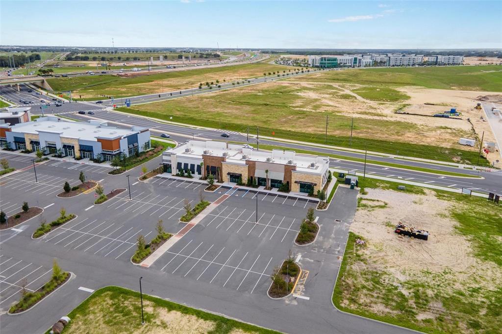 7159 Avalon Road, Unit 6 Winter Garden, FL 34787 - Photo 8 of 21 a view of a swimming pool and an ocean view