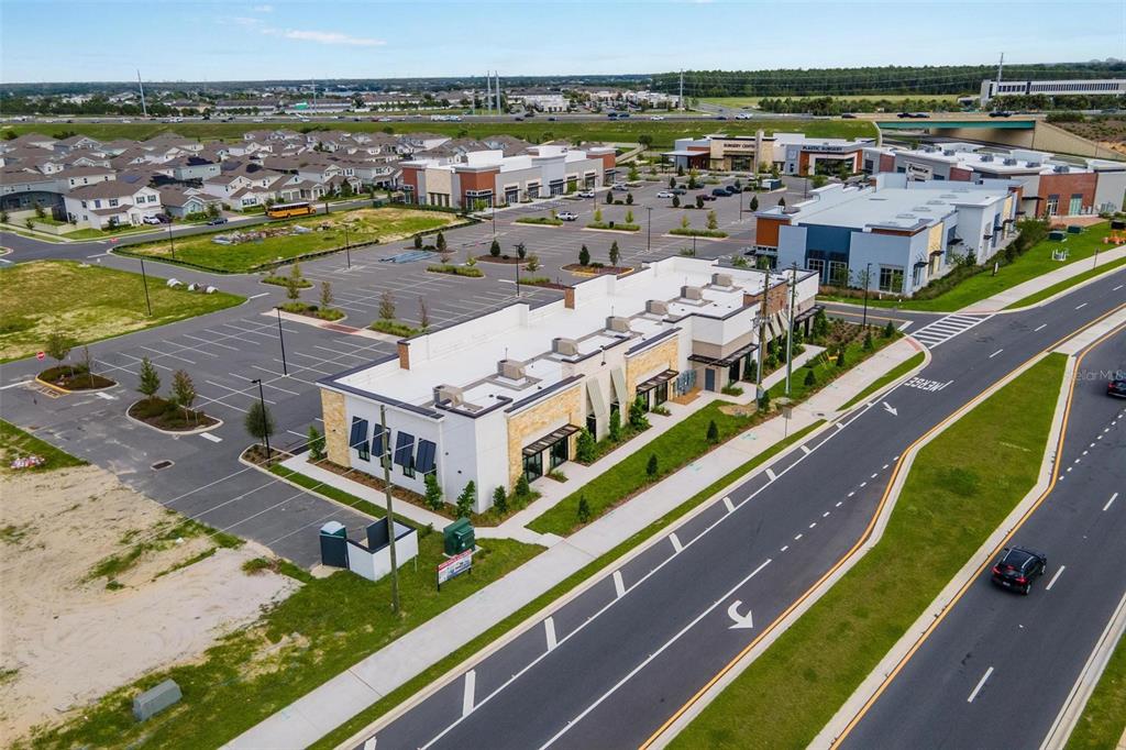 7159 Avalon Road, Unit 6 Winter Garden, FL 34787 - Photo 9 of 21 an aerial view of a city