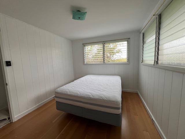 221 Upper Kimo Drive Kula, HI 96790 - Photo 18 of 21 a bed sitting in a room next to a window