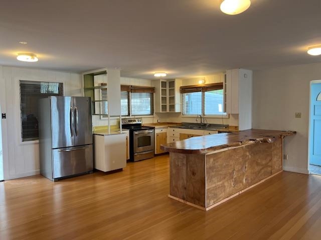 221 Upper Kimo Drive Kula, HI 96790 - Photo 4 of 21 a kitchen with stainless steel appliances granite countertop a stove and a refrigerator