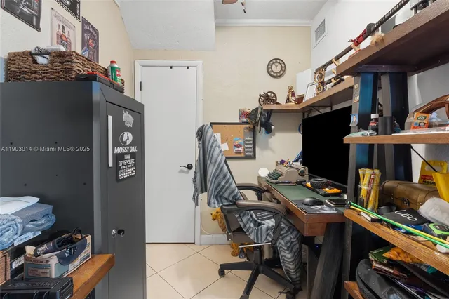 a view of a kitchen from the hallway