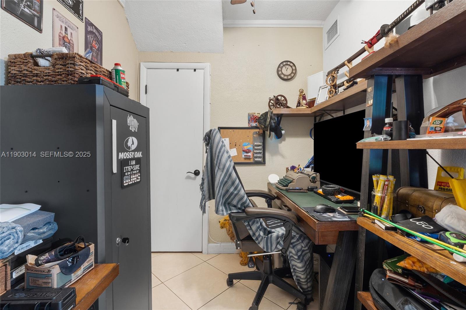 7144 West 2nd Lane Hialeah, FL 33014 - Photo 20 of 40 a work room with furniture and musical instruments