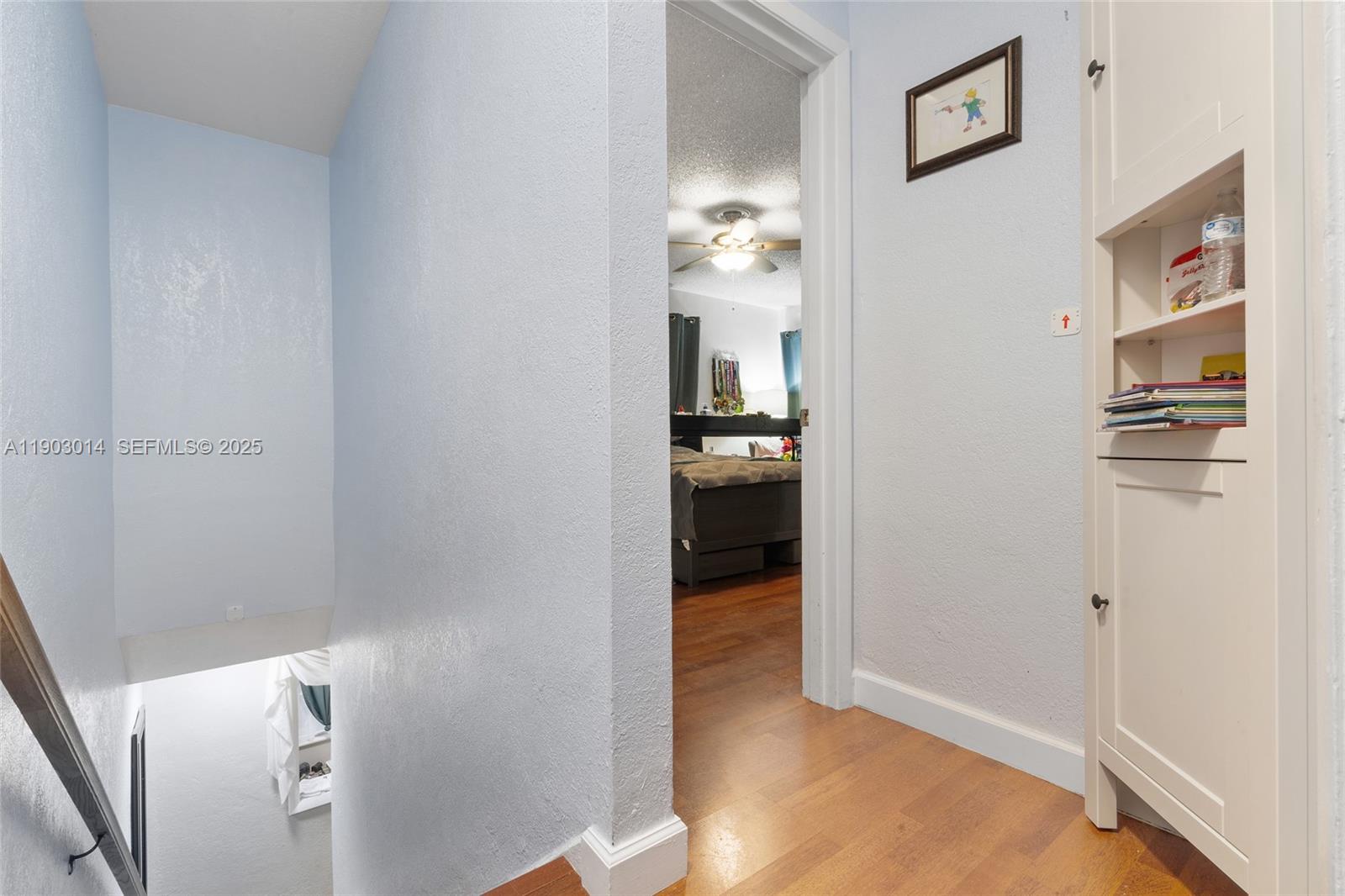 7144 West 2nd Lane Hialeah, FL 33014 - Photo 21 of 40 a view of a kitchen from the hallway