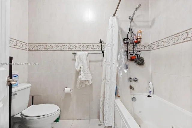 a bathroom with a double vanity sink and mirror