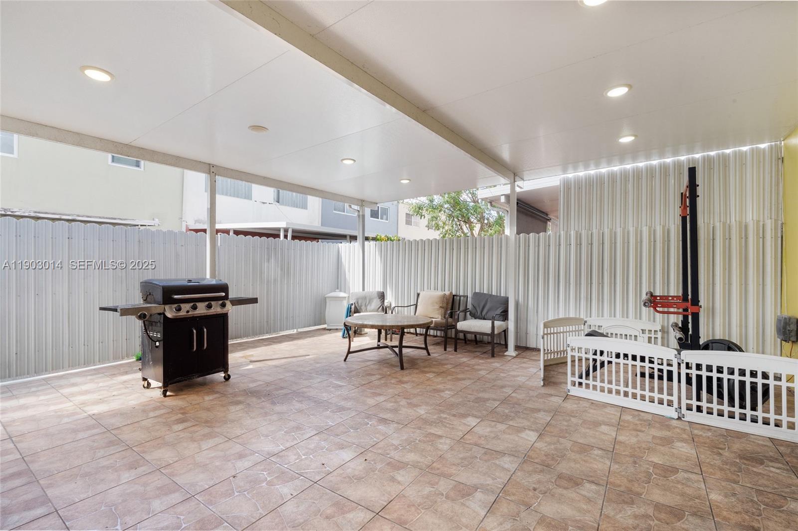 7144 West 2nd Lane Hialeah, FL 33014 - Photo 30 of 40 a outdoor space with furniture