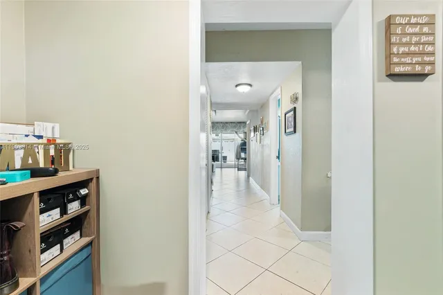 a view of a hallway with shelves