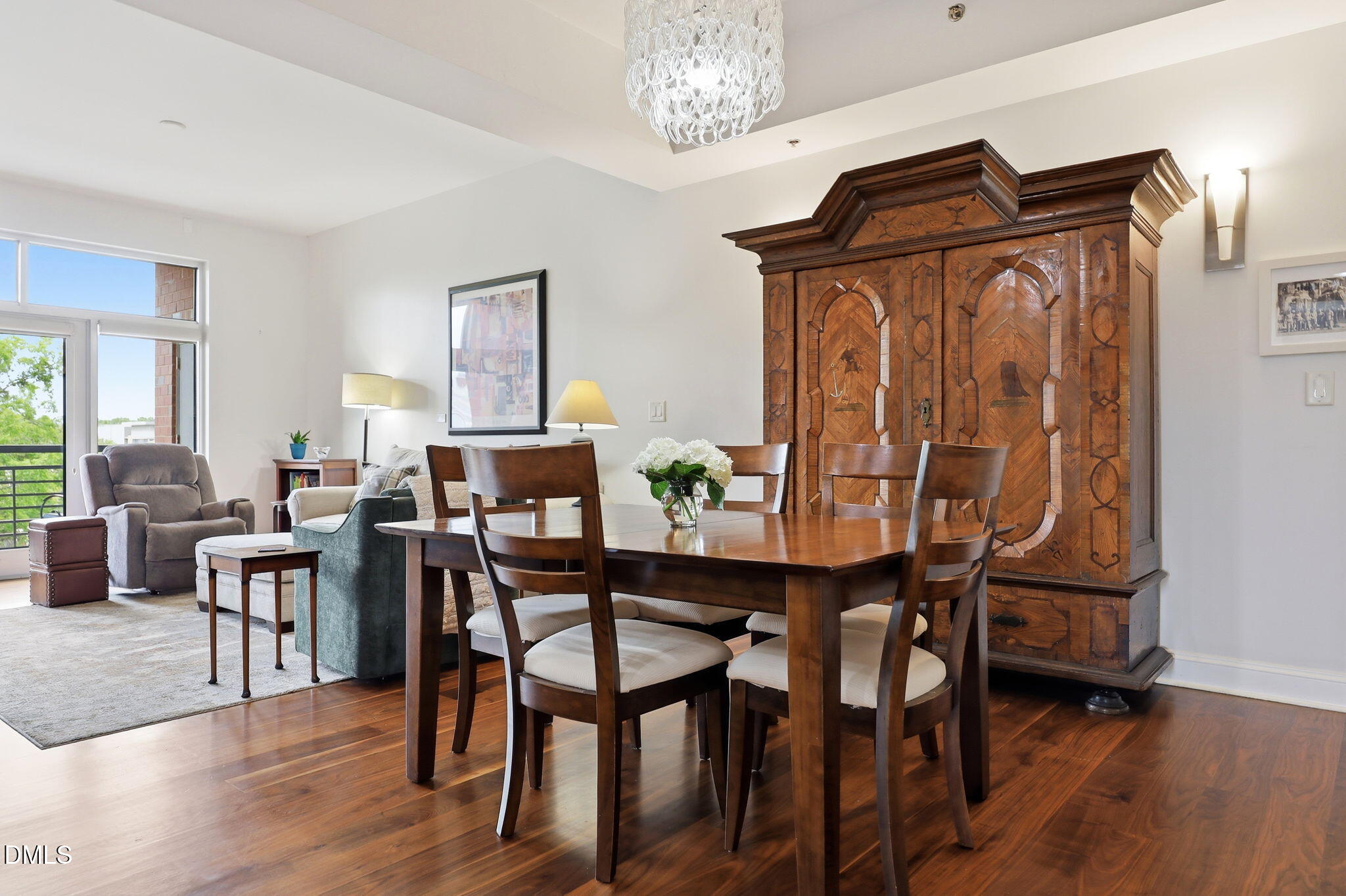 618 North Boylan Avenue, Unit 718 Raleigh, NC 27603 - Photo 4 of 38 a view of a dining room with furniture and wooden floor