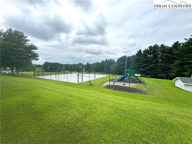 a view of a garden and basketball court