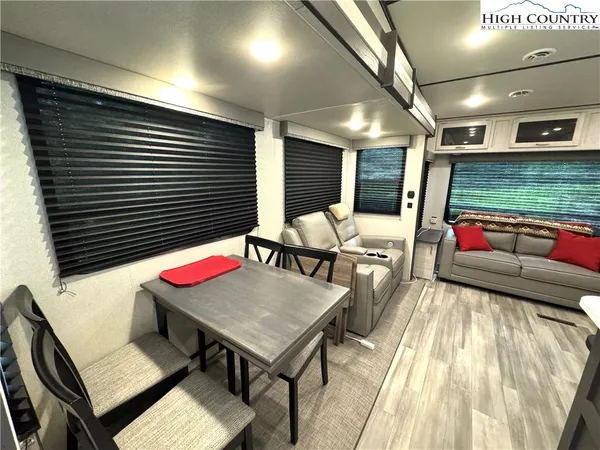 a view of a livingroom with furniture