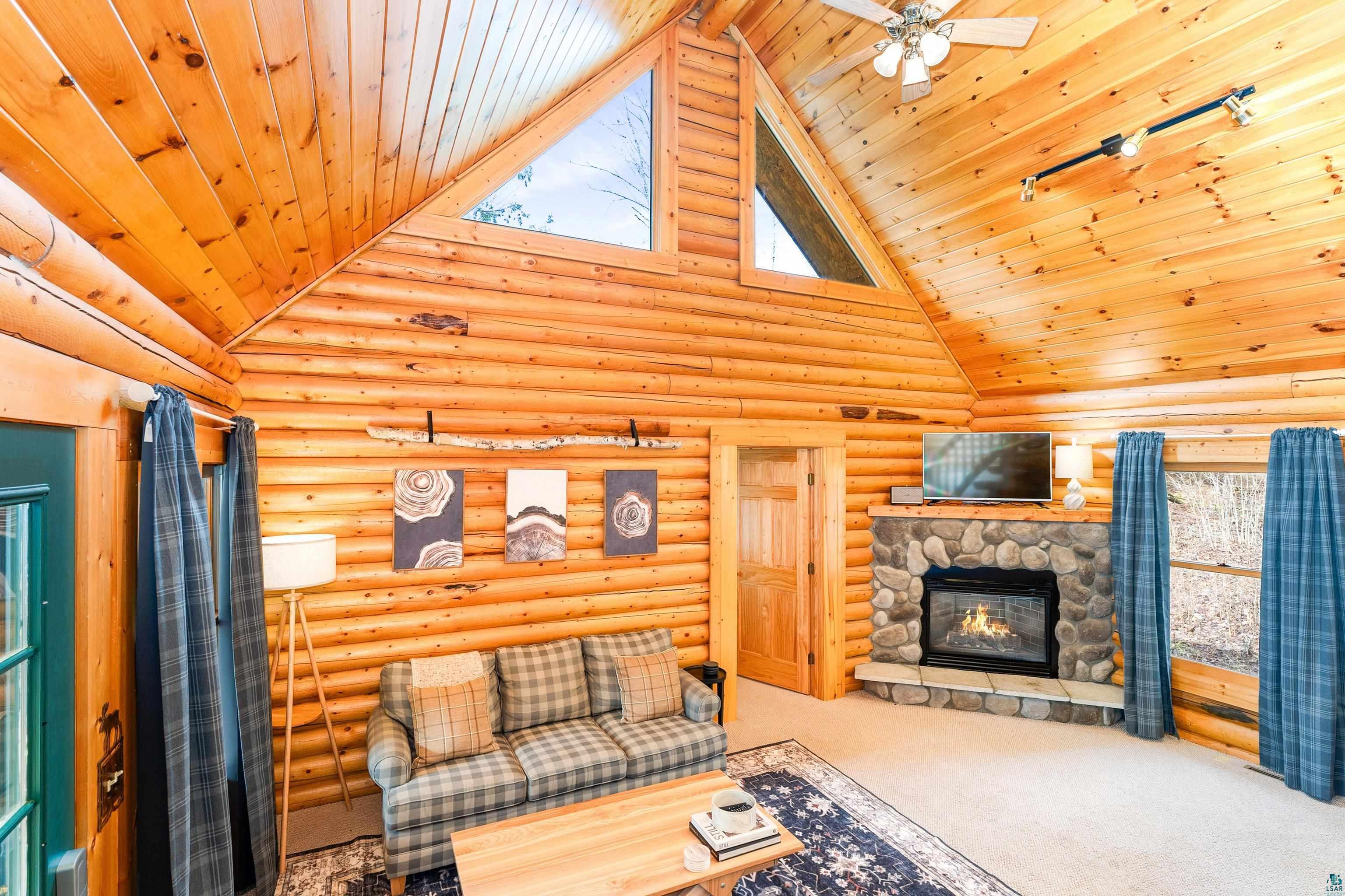 2659 Ridgeview Drive Two Harbors, MN 55616 - Photo 34 of 56 Vaulted wood-paneled ceilings with exposed beams and triangular windows