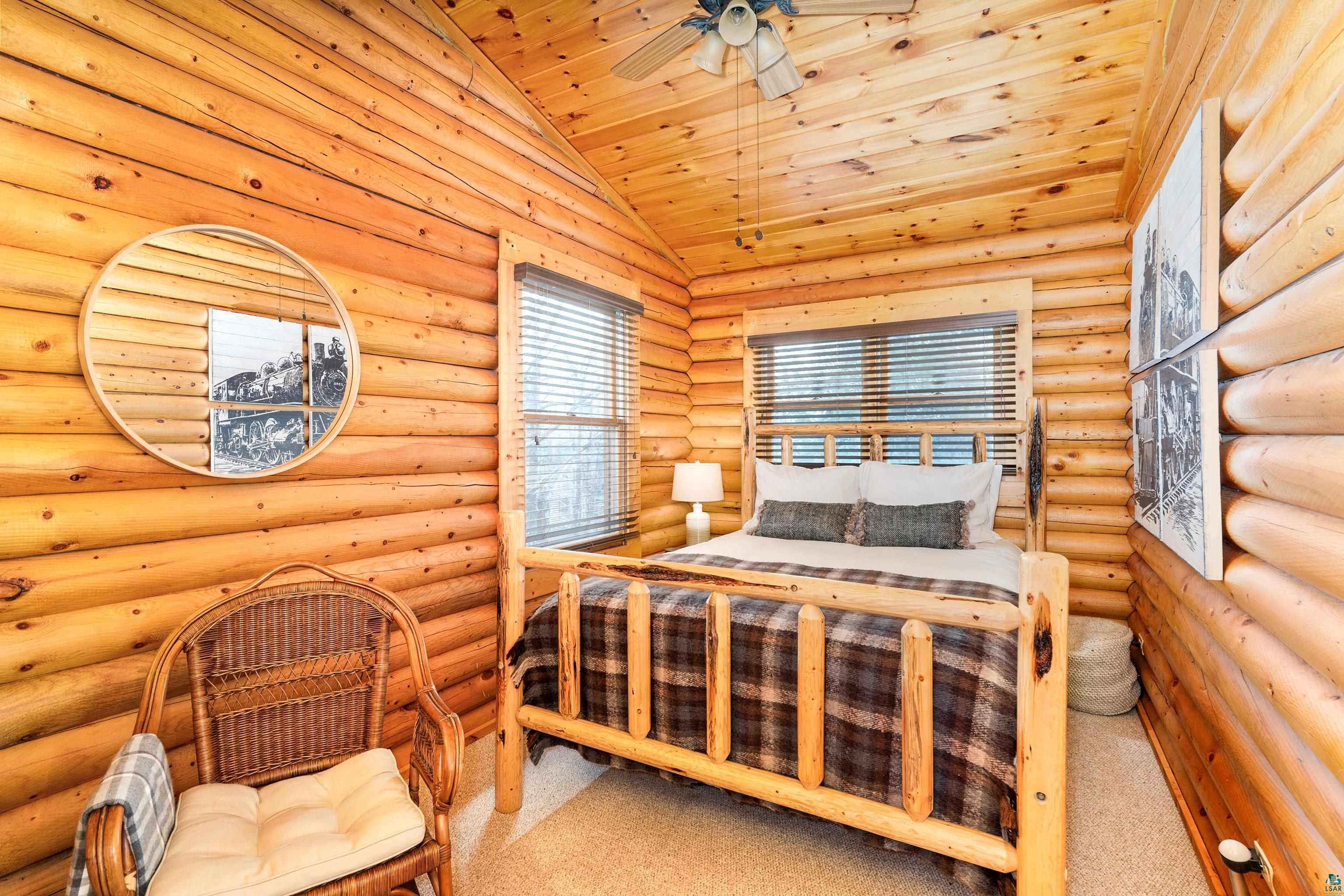 2659 Ridgeview Drive Two Harbors, MN 55616 - Photo 36 of 56 Log cabin interior featuring natural wood walls and vaulted wood-paneled ceiling