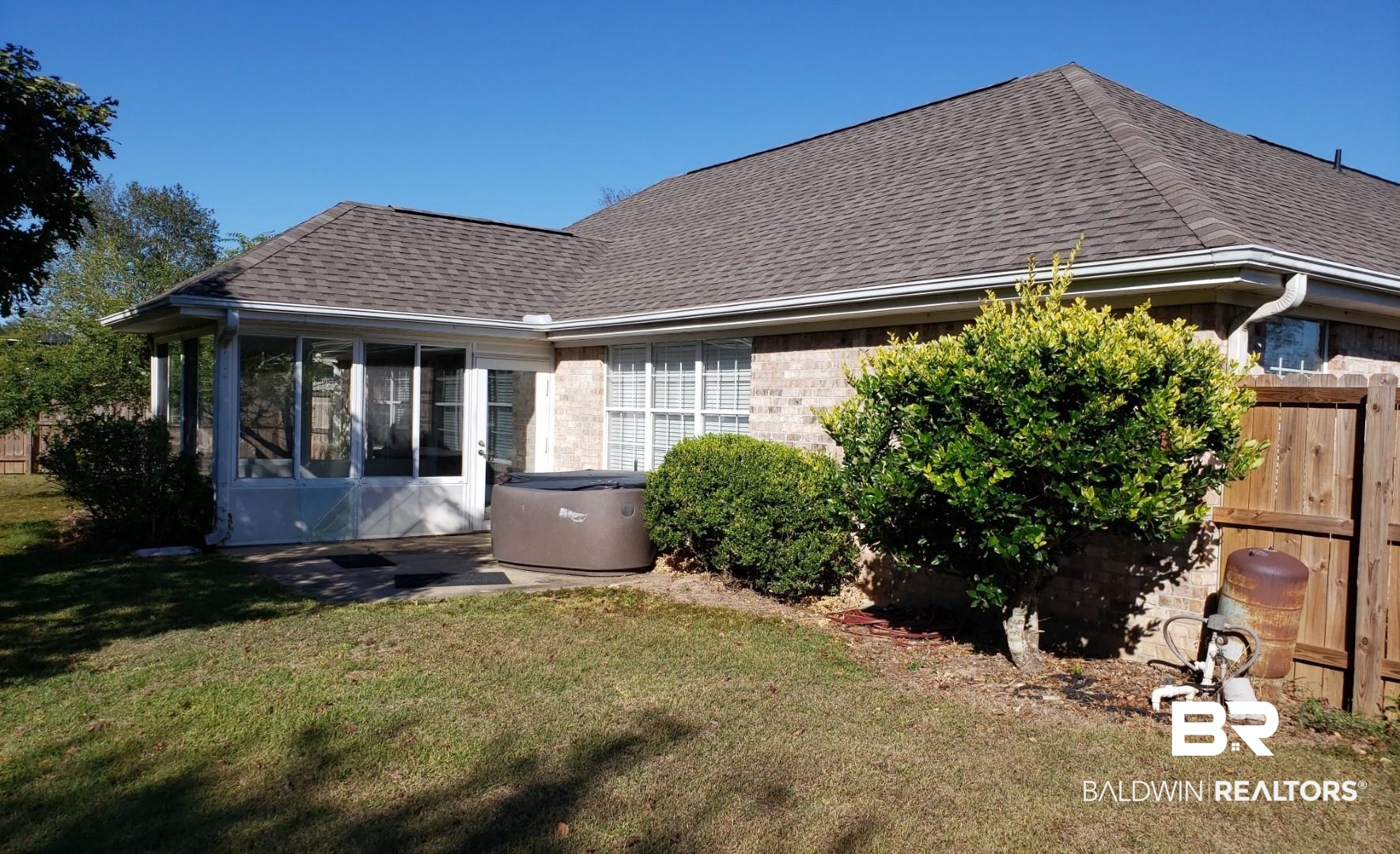 14535 Abacus Drive Foley, AL 36535 - Photo 13 of 15 Sunroom and Hot Tub!