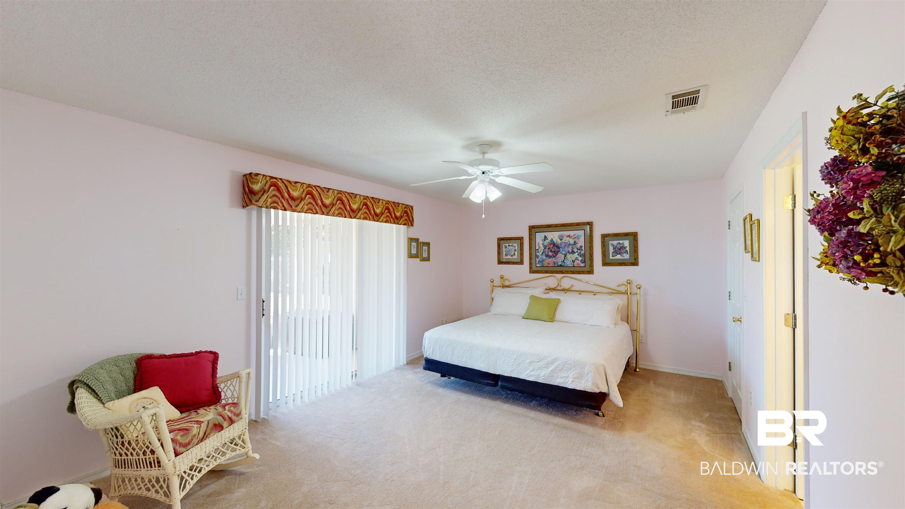 9445 Villas Drive Foley, AL 36535 - Photo 10 of 20 Carpeted bedroom with ceiling fan and a textured ceiling