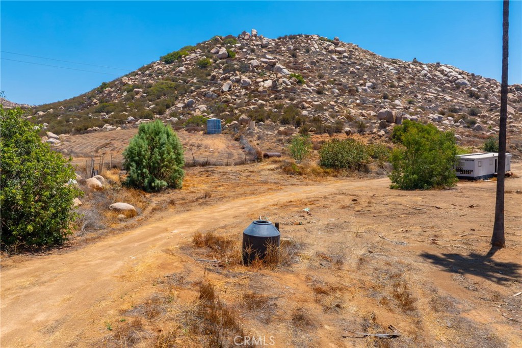 24900 El Toro Road Perris, CA 92570 - Photo 13 of 36 a view of a backyard of the house