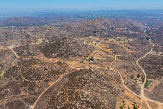 a view of ocean and a mountain