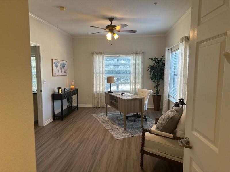 8707 Valley Ranch Parkway West, Unit 335 Irving, TX 75063 - Photo 7 of 11 a view of a dining room with furniture and a window