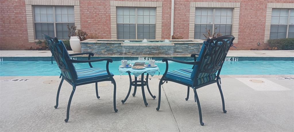 8707 Valley Ranch Parkway West, Unit 335 Irving, TX 75063 - Photo 10 of 11 a view of an outdoor seating area