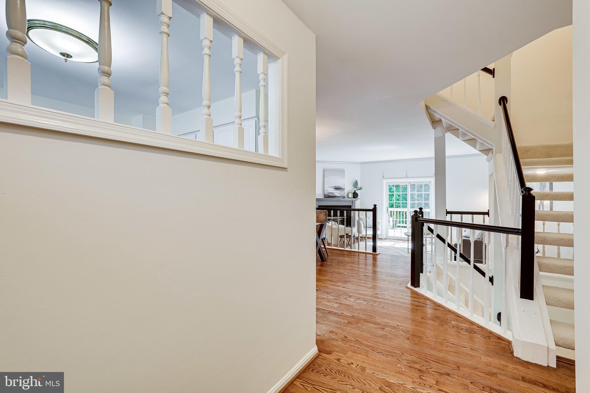 11962 Sentinel Point Court Reston, VA 20191 - Photo 4 of 62 The foyer opens to the dining & living rooms.