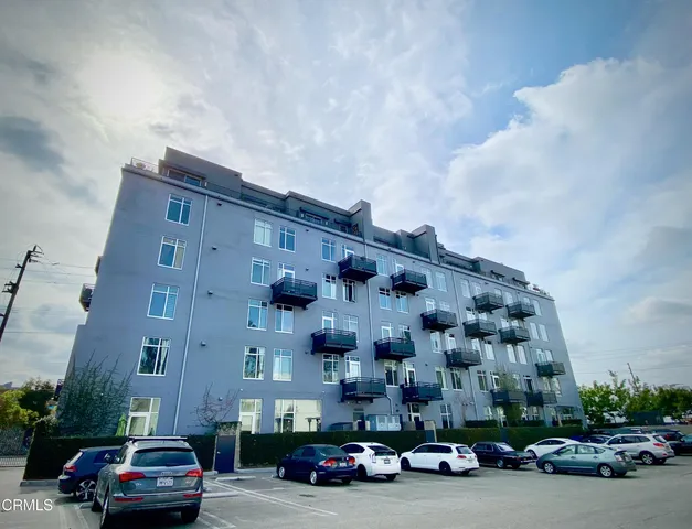 a view of a balcony with an ocean