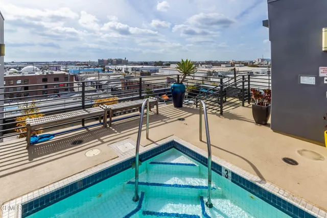 a view of roof deck with patio
