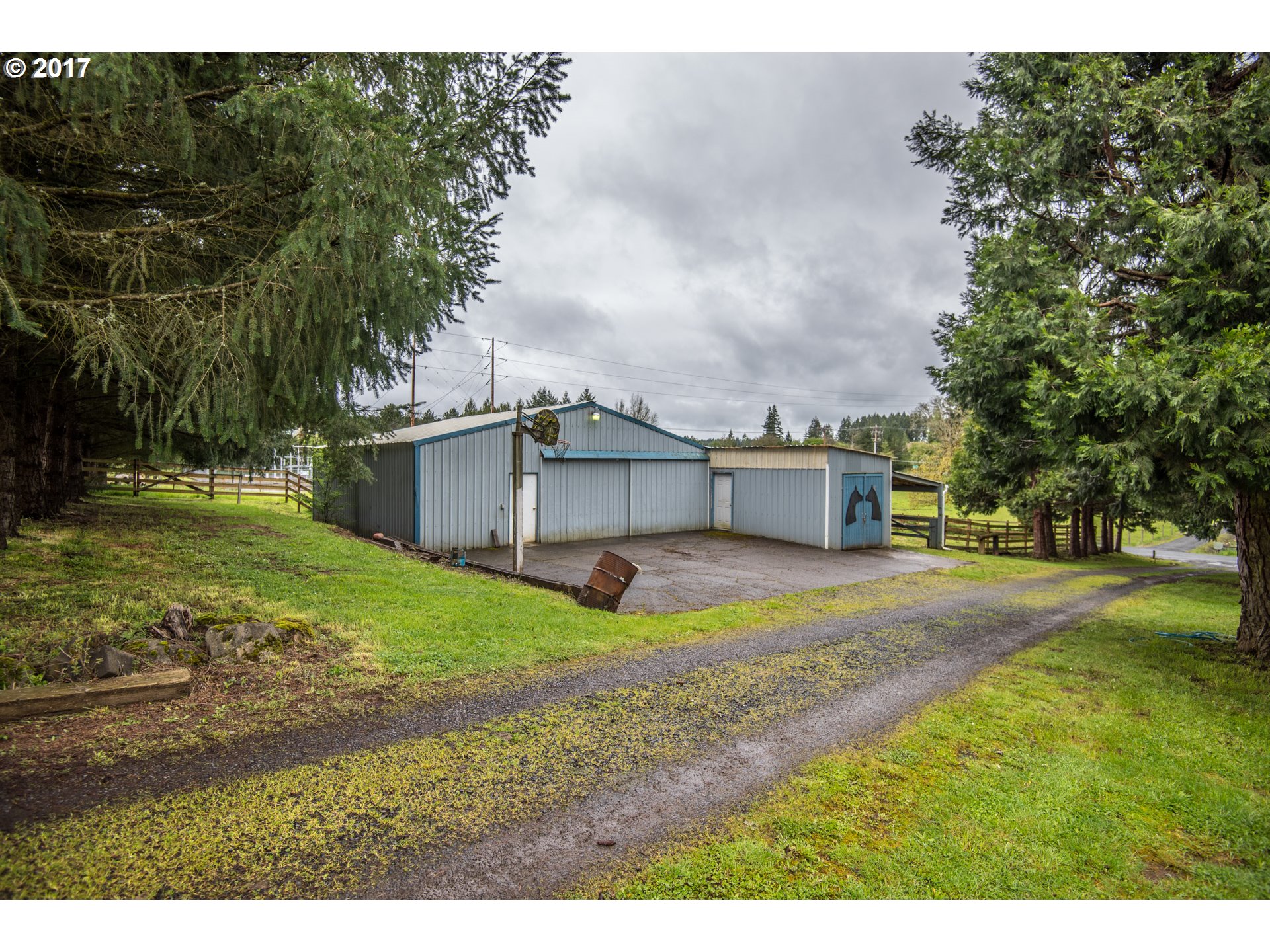 29964 South Hult Road Colton, OR 97017 - Photo 11 of 17 a view of a backyard with large trees