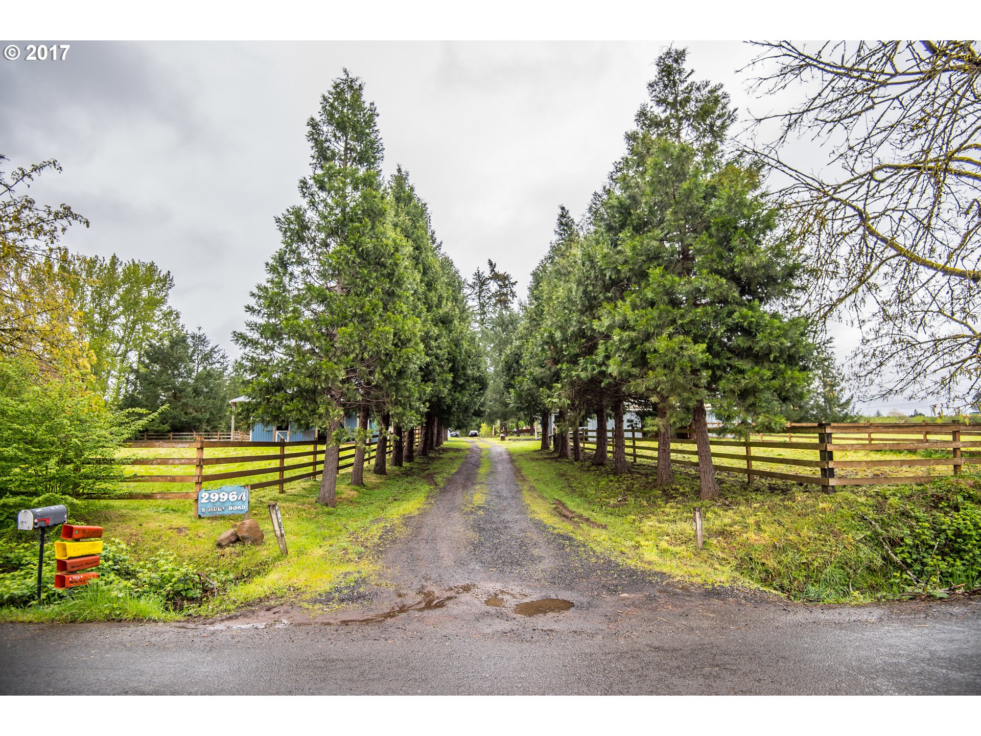29964 South Hult Road Colton, OR 97017 - Photo 13 of 17 a view of a swimming pool with a garden and plants