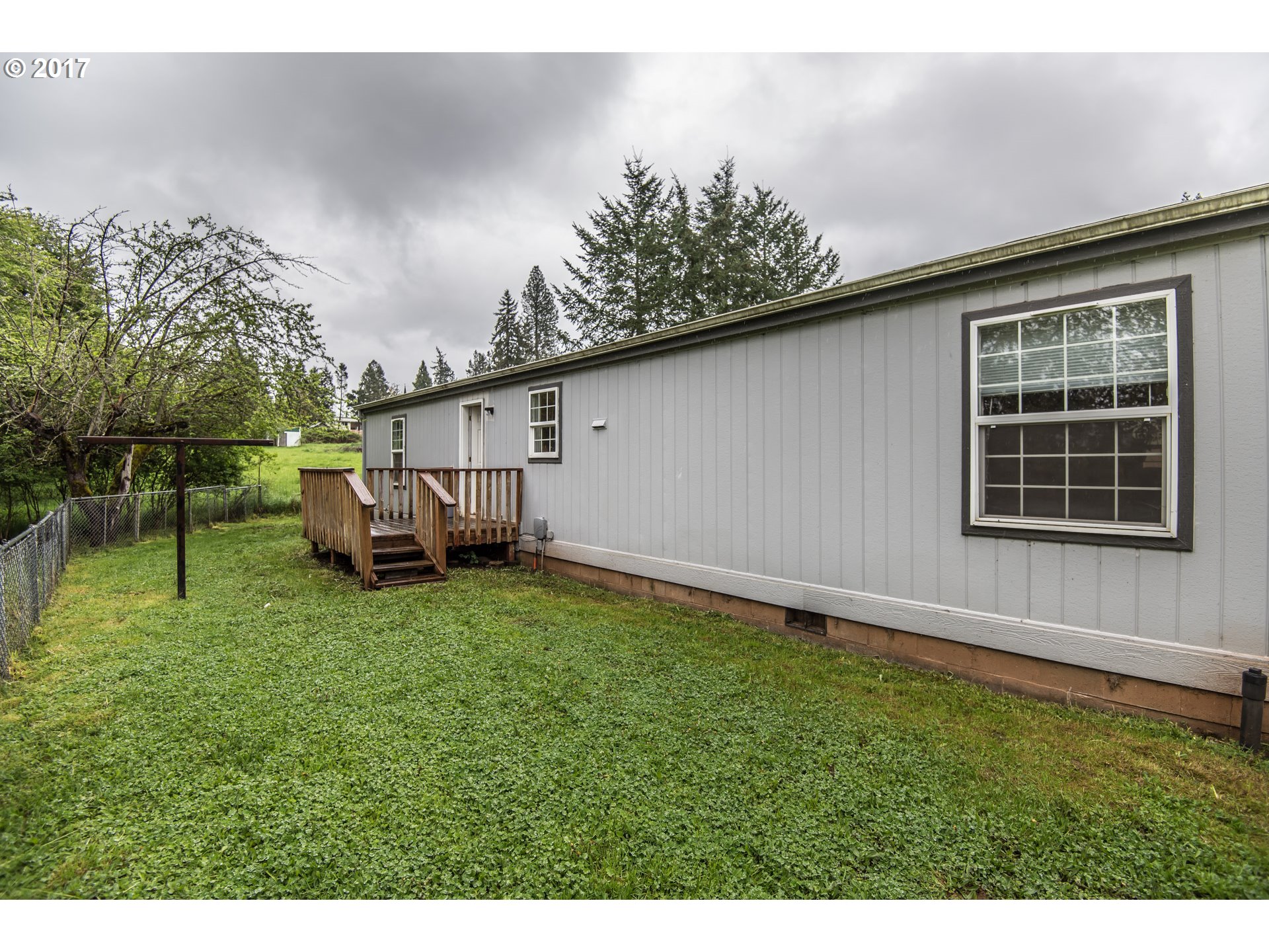 29964 South Hult Road Colton, OR 97017 - Photo 17 of 17 a backyard of a house with lots of green space