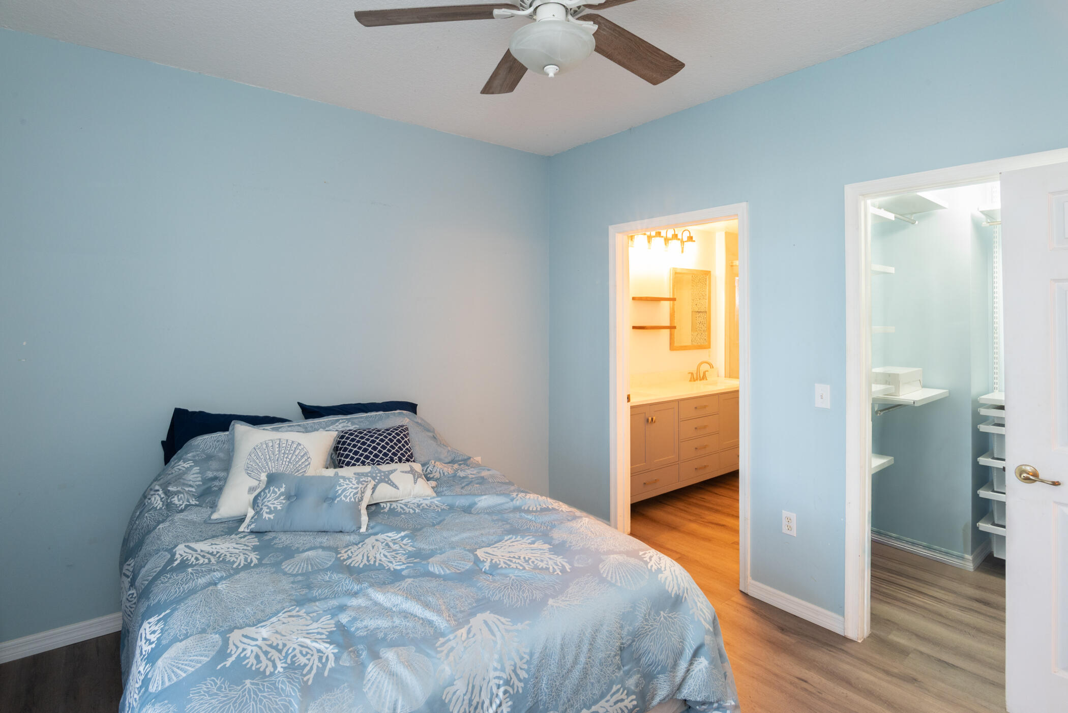1140 University Boulevard, Unit 10 Jupiter, FL 33458 - Photo 13 of 21 Master Bedroom and Bathroom