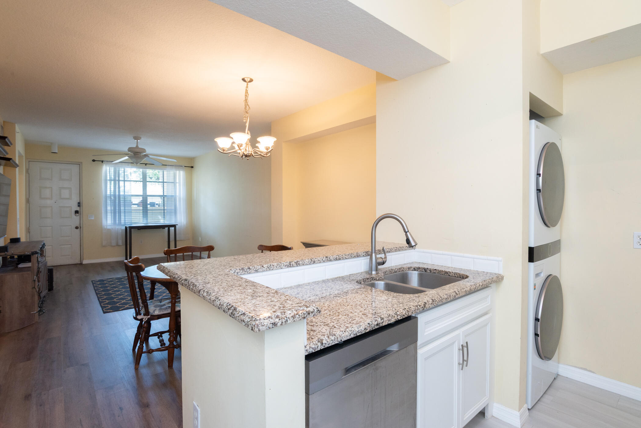 1140 University Boulevard, Unit 10 Jupiter, FL 33458 - Photo 10 of 21 Kitchen and Laundry