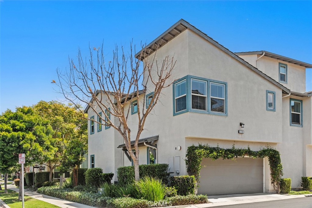 128 Natal Road Rancho Mission Viejo, CA 92694 - Photo 2 of 30 a front view of a house with a garden