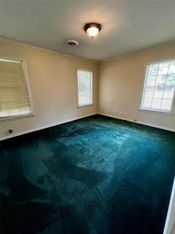 a view of an empty room with window