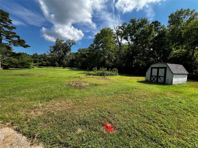 a view of a golf course with a garden