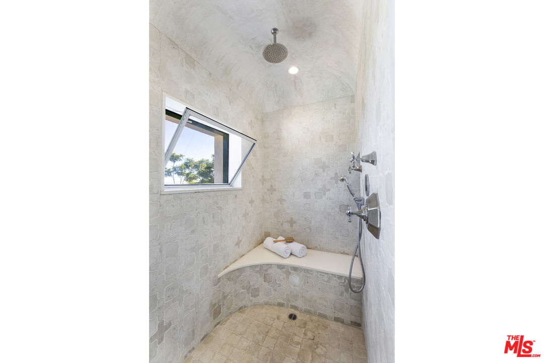 4565 Dundee Drive Los Angeles, CA 90027 - Photo 20 of 42 a bathroom with a sink and a toilet
