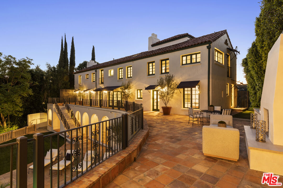 4565 Dundee Drive Los Angeles, CA 90027 - Photo 24 of 42 a front view of a house with parking space