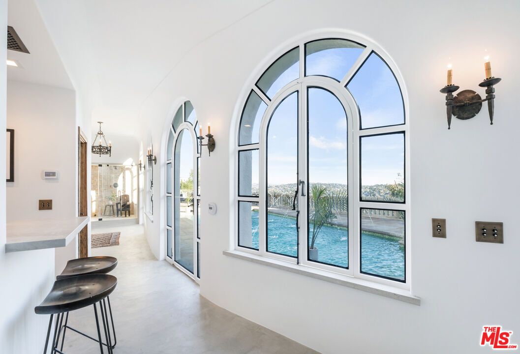 4565 Dundee Drive Los Angeles, CA 90027 - Photo 31 of 42 a view of en suite bathroom with a tub and shower
