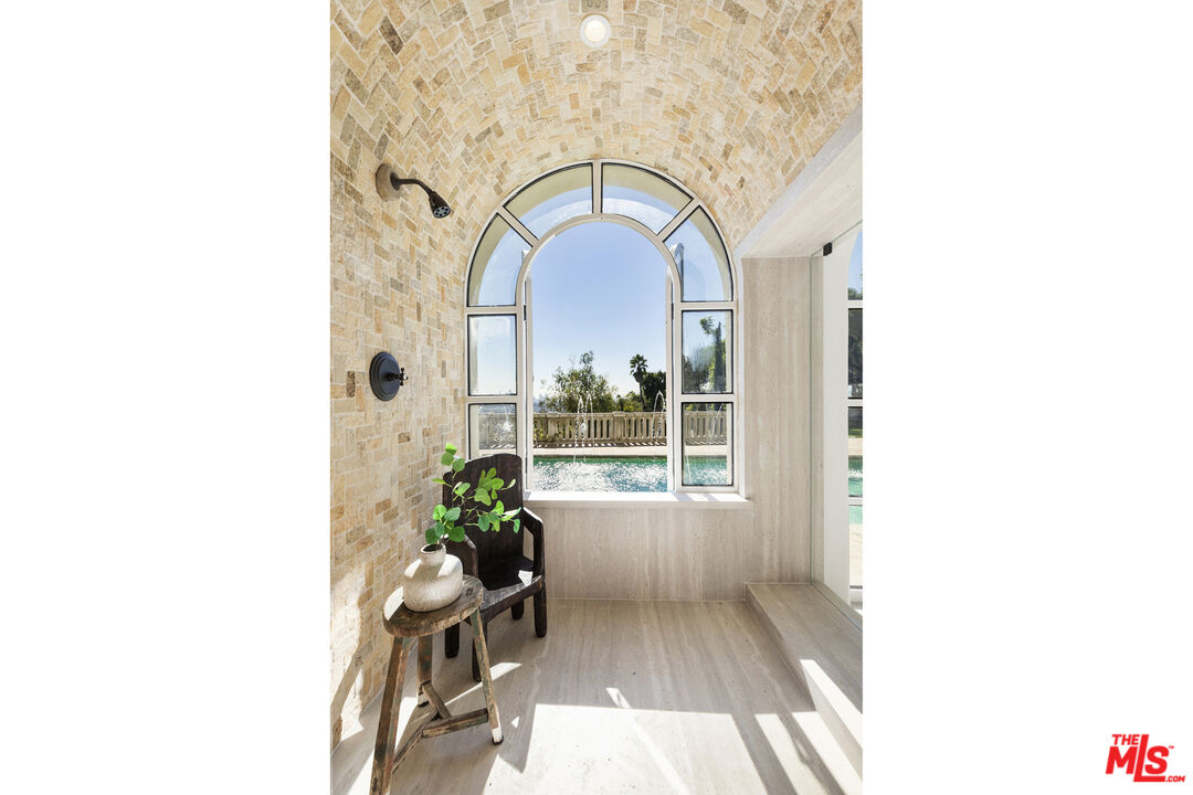 4565 Dundee Drive Los Angeles, CA 90027 - Photo 34 of 42 a view of a house with a porch