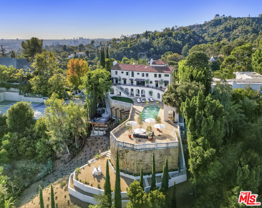 4565 Dundee Drive Los Angeles, CA 90027 - Photo 42 of 42 a terrace with outdoor seating and city view