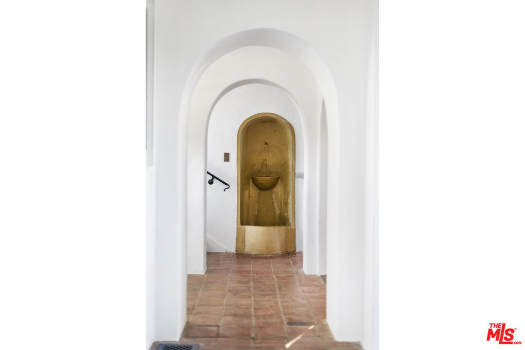 4565 Dundee Drive Los Angeles, CA 90027 - Photo 6 of 42 a view of a hallway with wooden floor