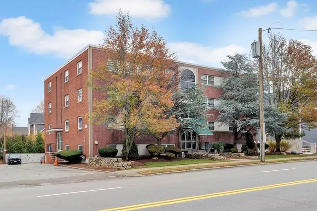 a view of a building and a street
